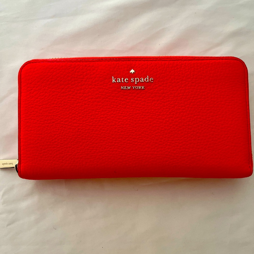 Kate Spade wallet. Hot summer color. Practicality Brand new!!!